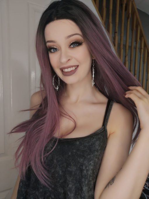 Purple long straight lace front wig. Maze is pretty and alluring, with brown overgrown roots that give a natural edge, blending into a mauve colour on these sleek locks.