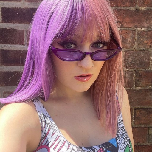 Half purple half pink split straight bob wig. Foxglove is a soft and subtle take on the split colouring technique. Split straight down the middle so each colour falls either side of the centre parting. A bold deep plum and a light orchid shade.