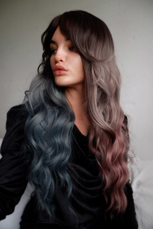 Lilac and blue long wavy split colour wig. Nisshoku is a little mixed up. Brown roots look natural and melts on one side a dusky lilac and the other a dusky blue. Perfect for those who can’t choose between styles Yoake and Yugure. Get two in one look!