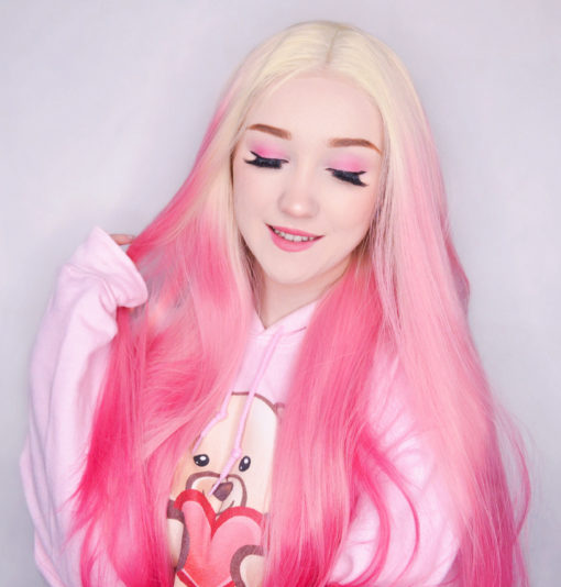 Blonde and pink straight long lace front wig. Lollipop is a firm fav! This sweet and dreamy ombre. A natural twist of blonde roots that melt into a dusky pink then a deep pink dip dye.