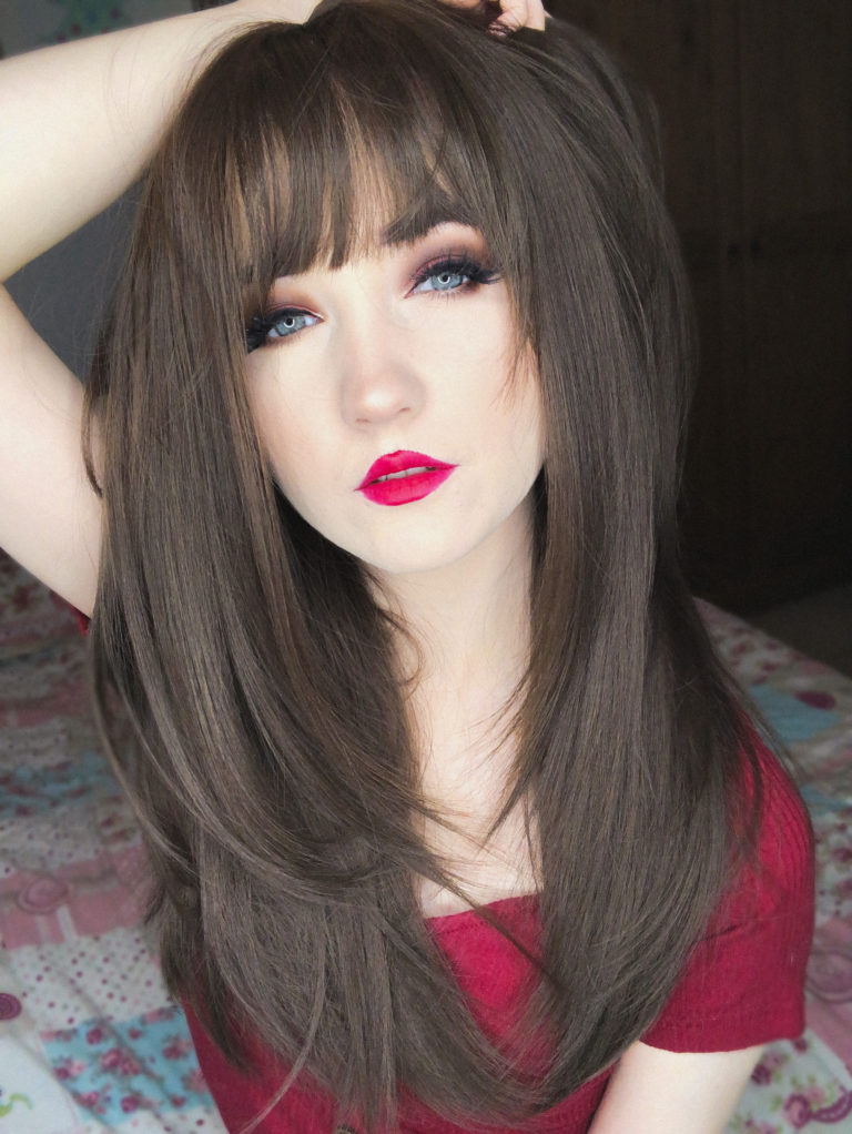 Sienna - Lush Wigs UK A sleek straight style in a natural chestnut colour. With long layers cut in and a blow out style to add fullness and movement. With a sleek blunt fringe.