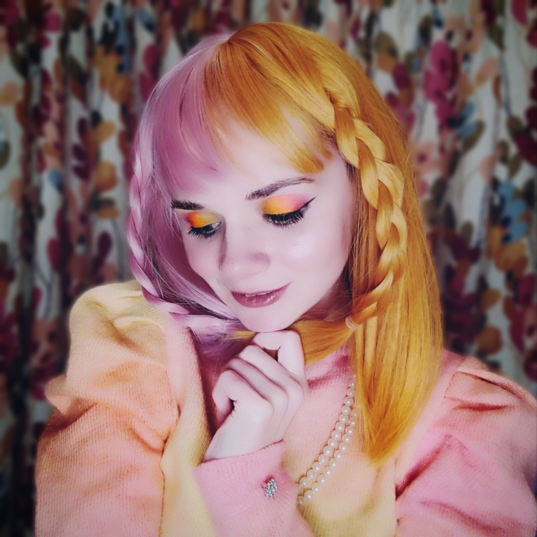 Popsicle - Lush Wigs UK These super cute pastel pink and yellow colours are a fresh take on split colour. Split down the centre parting and carrying the colour through the fringe. Styled straight and sleek.