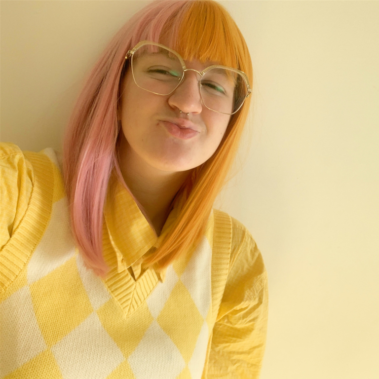 Popsicle - Lush Wigs UK These super cute pastel pink and yellow colours are a fresh take on split colour. Split down the centre parting and carrying the colour through the fringe. Styled straight and sleek.