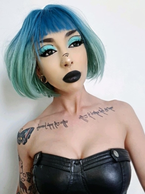 Tide - Lush Wigs UK Blue and green straight bob. Tide takes a classic bob style, and gives it a futuristic twist with colour blocking. A graduated cut thats sleek and smooth and on trend with vibrant colours. Steel blue roots thats carried into the fringe, and blending into a turquoise green that will be hard not to miss!