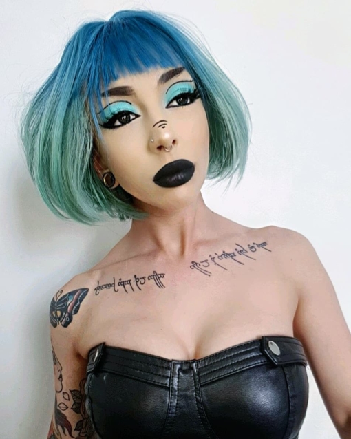 Blue and green straight bob. Tide takes a classic bob style, and gives it a futuristic twist with colour blocking. A graduated cut thats sleek and smooth and on trend with vibrant colours. Steel blue roots thats carried into the fringe, and blending into a turquoise green thats hard not to miss!