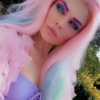Pastel green long lace front wig. Looking for that ice queen look? Fortune Teller has black roots that blend into a mix of minty pastel green and silver tones. Sleek layered hair with a barely-there wave.