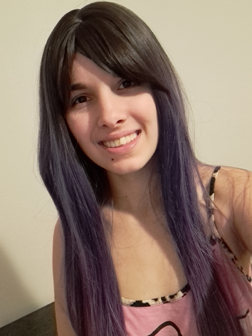 Go intergalactic! Galaxy has a mix of muted blues, purples and lilac streaks with a washed out lilac dip dye effect. Dark brown grown out roots adds an relaxed feel to this grungy look. Styled sleek with a light wispy fringe.