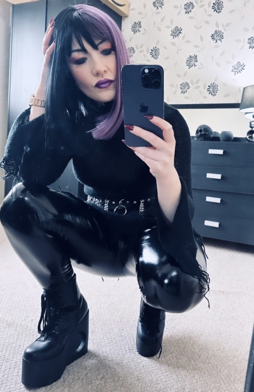 Nova takes on the dramatic colour divide. Gothic mix of purple and black colours. Split down the centre parting and carrying the colour through the fringe.