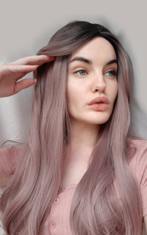 Inspired by the 60s and 70s bohemian look, with jaw skimming layers on each side of the parting. Shogo has a natural twist with brown shadowed roots melting into dusky pink hues. 