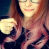Want a little rose-gold with a pop of pink? Rosebud is a gingery brown colour from the sleek roots and airy fringe. Falling into a curly rose pink ombre.