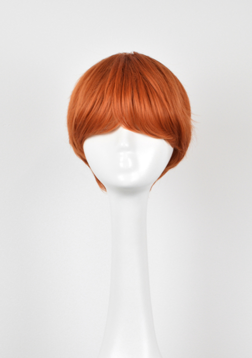 Orange short pixie cut wig with bangs. Short and sweet is squash, our pixie cut that's hard to ignore with its choppy layers, giving texture and volume to the bright orange colour. Style for that natural look or mess it up for maximum impact.