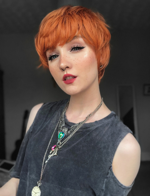 Our shortest pixie style yet. Squash is a gorgeous clementine orange colour, cut in short layers to the nape of the neck. Wear it brushed forward for that Mary Quant mod look, or swept to the side to create layers.