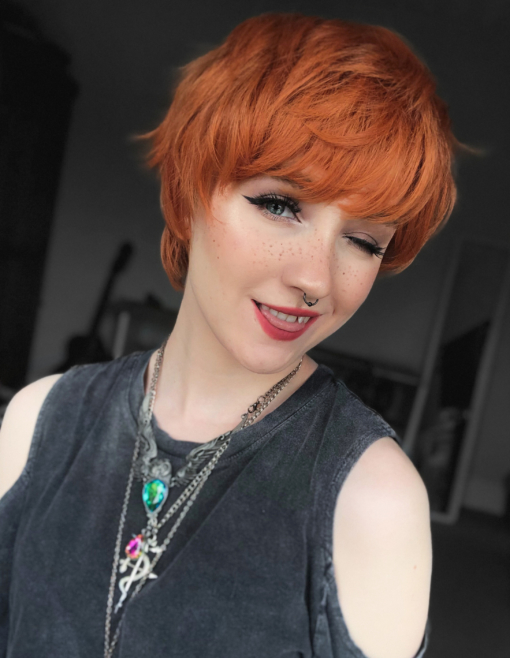 Our shortest pixie style yet. Squash is a gorgeous clementine orange colour, cut in short layers to the nape of the neck. Wear it brushed forward for that Mary Quant mod look, or swept to the side to create layers. 