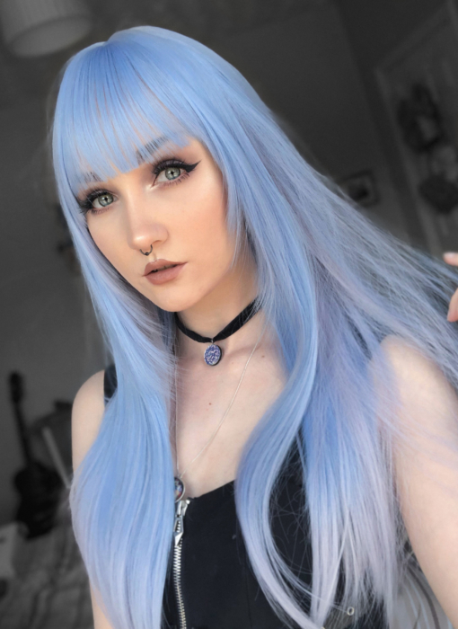 Zenith touches the sky with a mix of baby blue and whitish grey colours. Long and sleek with icy grey dip-dye on the ends. The full fringe with face framing layers to the jaw add some extra movement.