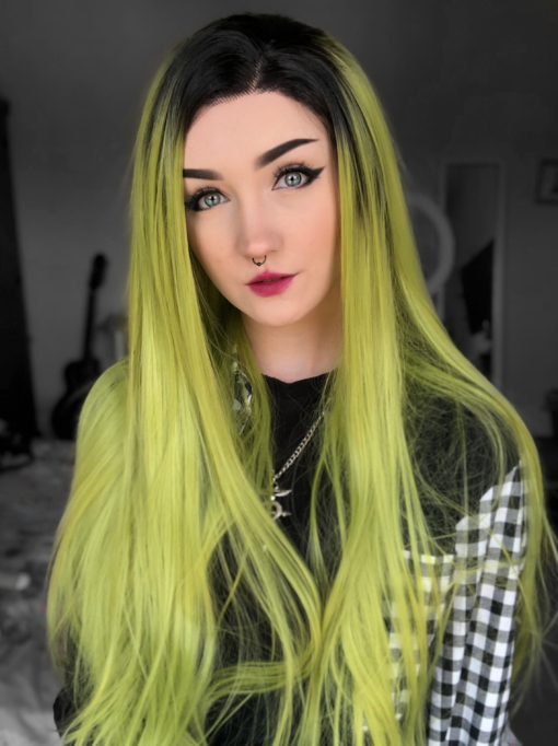 Lime green long straight lace front wig. Shamrock is certainly not for the faint hearted! This lime green look has a natural twist of black roots that make this style so bold. Long with barely there waves.