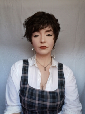 Elder - Lush Wigs UK A cute pixie cut in a dark brunette colour. Sleek short layers are blow dried with a large barrel brush. Wear it forward or swept to the side away from the face.