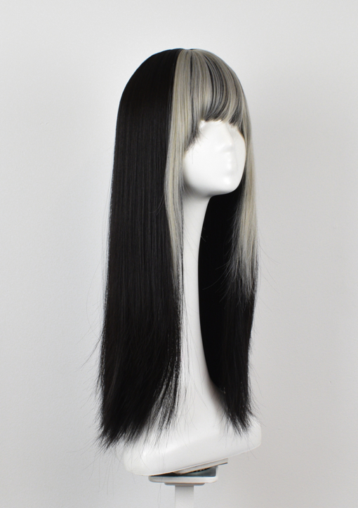 Billie takes the money piece colouring technique, with an earthy grey tone thats carried through the fringe. Long sleek classic black layers add texture and movement to the style.