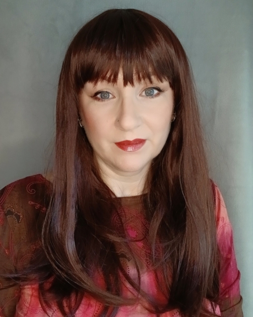 Chocolate is a natural mix of auburn and brown to create this beautiful warm colour from roots to tips. Sleek long layers are styled in a blow out for volume. Its long thick full fringe can be cut to suit the wearer.