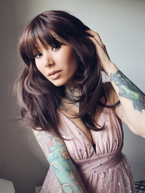Chocolate is a natural mix of auburn and brown to create this beautiful warm colour from roots to tips. Sleek long layers are styled in a blow out for volume. Its long thick full fringe can be cut to suit the wearer.