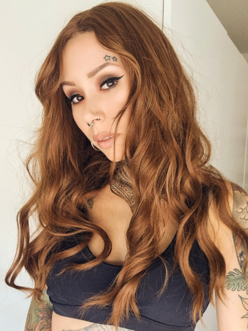 Tabitha - Lush Wigs UK A natural fringeless wig with a golden brown hue from roots to tips. Long lengths are styled into a relaxed flat iron wave. That leaves the ends of the hair sleek.