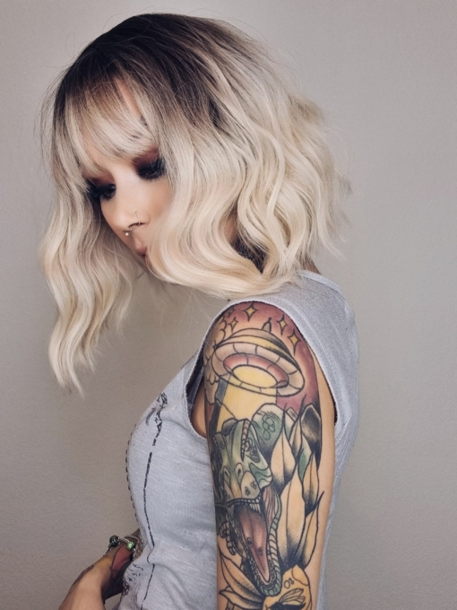 Platinum blonde. Tick. Effortless waves. Tick. We needed a new addition to our Teatime Collection and Ice tea is perfect. Brown shadowed roots grow into this icy hue, giving a natural feel to this wavy bob with a sleek light fringe.