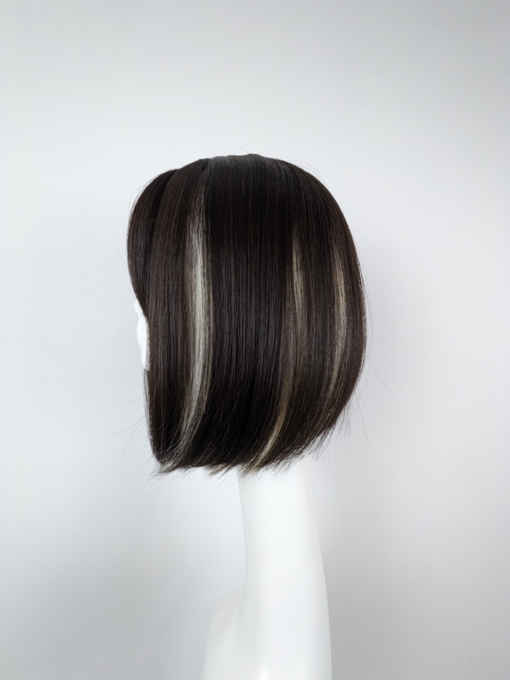 One length dark brown bob, that has a blonde colour underneath for a peek-a-boo effect. sleek and straight. With a light fringe.