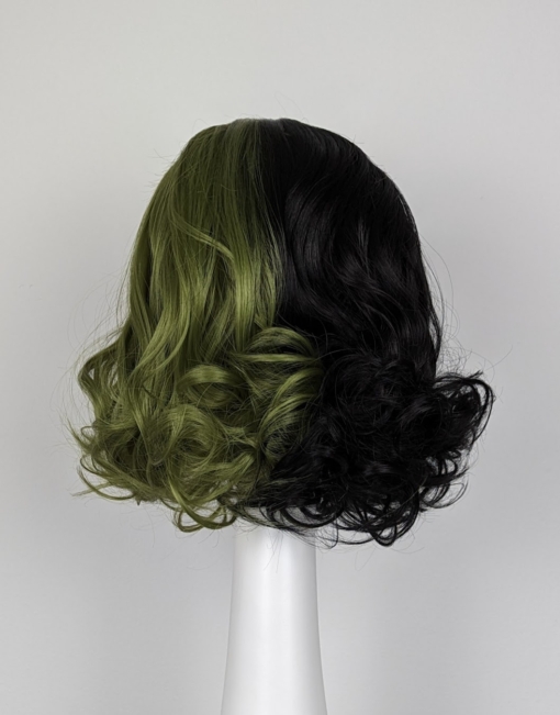 Green and black split colour wig. This dishevelled bob has plenty of volume and bounce.
