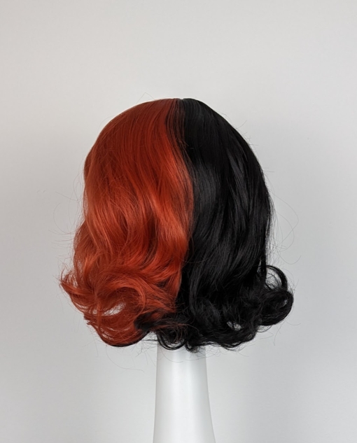 Red and black split colour wig. This dishevelled bob has plenty of volume and bounce.