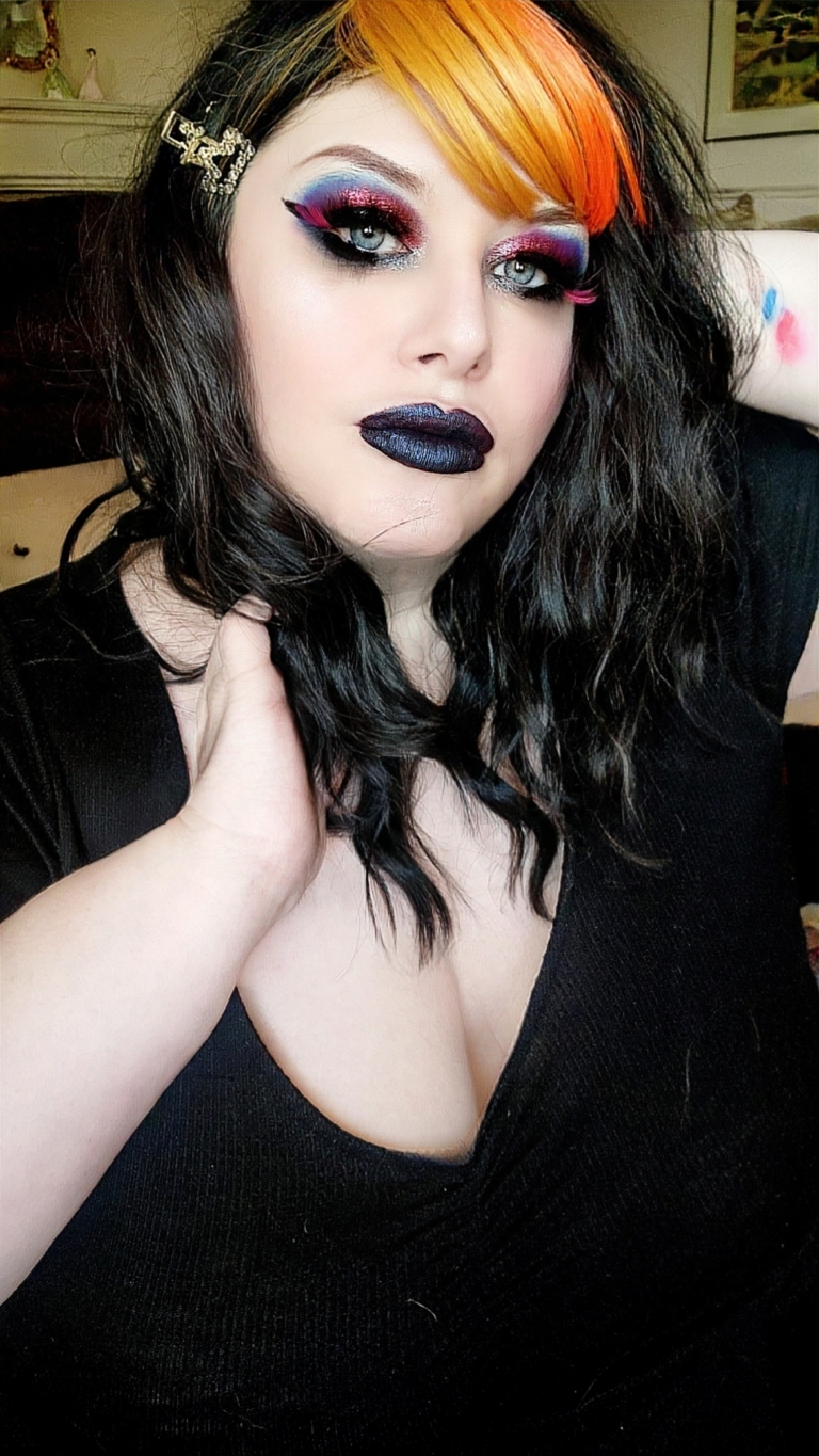 Wildfire has all the warmth of yellow and orange in the sleek fringe. Very dark brown waves with thickness and volume that falls just past the shoulders.