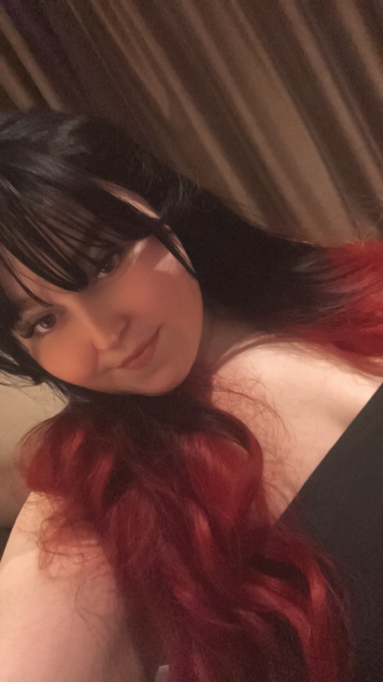 Black and red go together in perfect harmony. Cinnabar is our latest ombre of cool black and wine red. Styled in a blow out with long layers for movement. A blunt fringe frames the face.