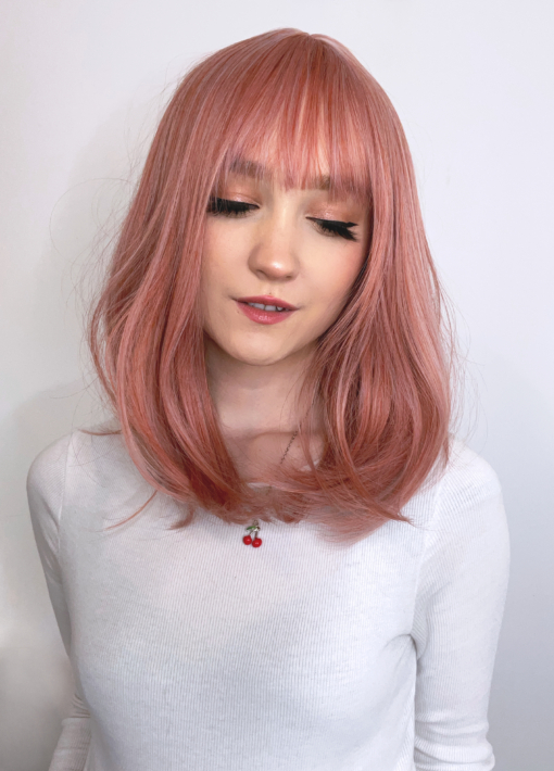 Various colours are mixed to make a unique peach colour. This style is so easy to wear and the ideal wig for everyday wear.