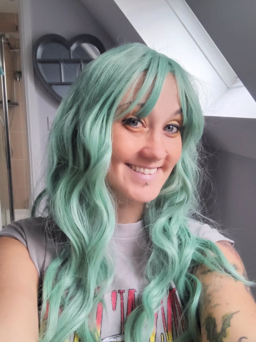 Aqua green from roots to tips, seagrass comes in loose braided waves. Long layers and a sleek fringe. This look is a staple for any mermaid wannabes.