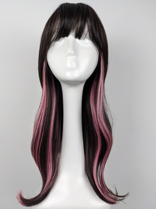 Dark brown colour with pink streaks coming from the nape of the neck for a peek-a-boo effect. Blow out style falls to the waist With a full fringe.
