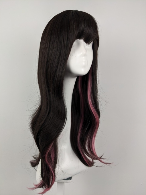 Dark brown colour with pink streaks coming from the nape of the neck for a peek-a-boo effect. Blow out style falls to the waist With a full fringe.