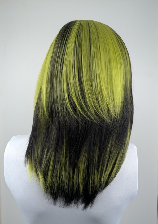 Aurora - Lush Wigs UK Blocks of leaf green colour are carried through the black lengths of this sleek long bob. Sleek and choppy with lots of layers. The green colour is carried into the fringe and on top of the head. Lots of green undertones for a peek-a-boo effect.