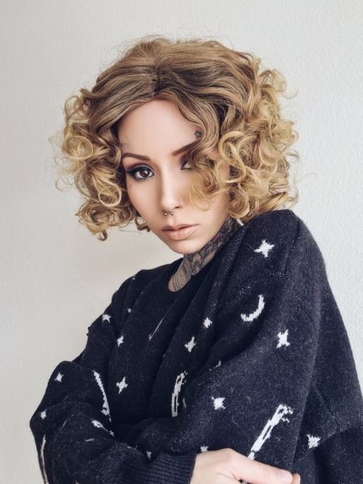 Calling all dancing queens! Stargaze is a vibrant and fresh style. Dark brown roots with ash blonde locks. This tight spiral curl wig is perfect for those who want to try a mop of curls without hours of styling!
