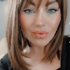 This earthy natural light brown wig is simple and chic. It certainly lives up to the name. A sleek long bob (lob) with a light fringe create the perfect shades for a natural look.