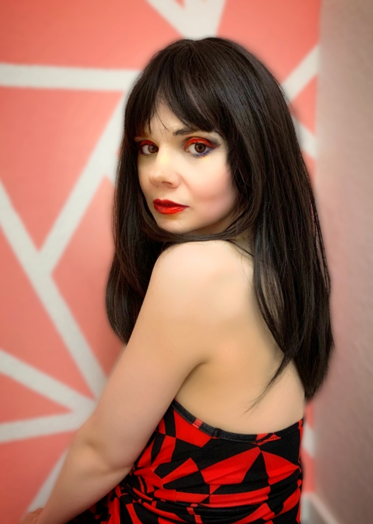 Dark Chocolate - Lush Wigs UK Dark chocolate is a natural brown-black colour from roots to tips. Sleek long layers are styled in a blow out for volume. A sleek long thick blunt fringe add volume to the look.