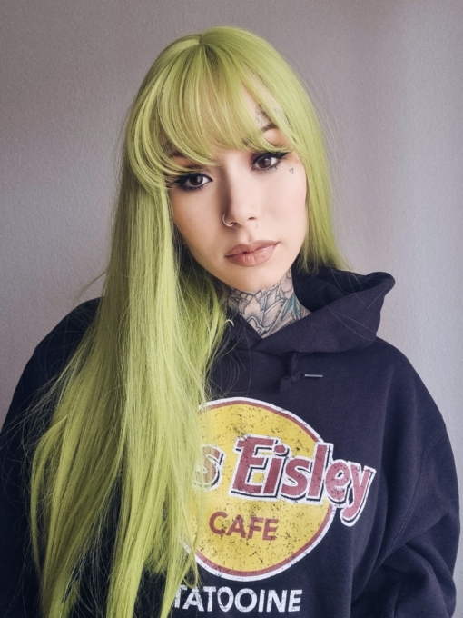 A straight long vibrant wig in a swampy green colour from roots to tip.