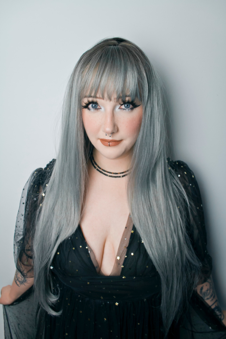 Grace - Lush Wigs UK Grace has dark brown roots for that natural look, that blends into this ashy grey colour. Sleek and straight falling to the waist. The fringe is sleek and blunt.