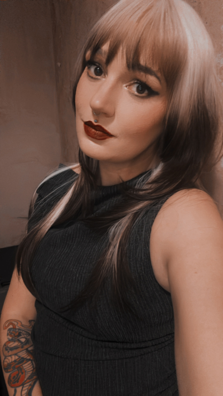 This natural wig comes in a mix of light blonde roots. They blend into a warm brown hue for a dip dye effect on the ends. A sleek long style with long layers at the back, face framing layers at the front make this style easy to maintain. With a sleek blunt fringe finishes the look.