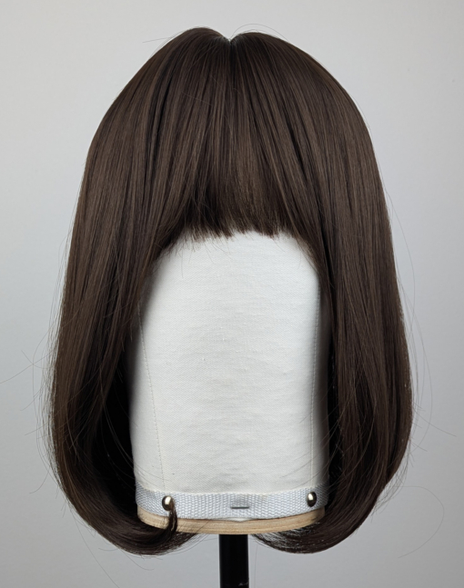 Outlet #156 - Lush Wigs UK A soft and natural warm chestnut tone from roots to tips. A graduated cut that curls under, falling just below the jawline, with a sleek blunt fringe. A simple yet stylish cut that’s easy to maintain.