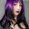 Myth - Lush Wigs UK This wavy bob comes to life with a face framing slice of bright purple colour. Thats carried into the sleek fringe and adds a peek-a-boo at the sides. A soft black colour from roots to tips.
