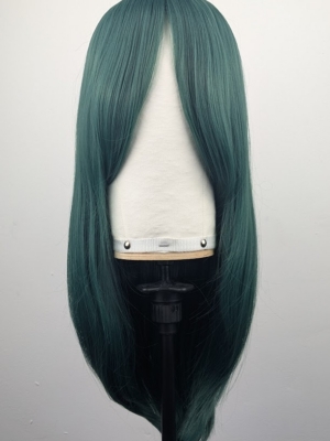 This dark green wig from roots to tips. Styled sleek with long layers falling to the waist. The fringe is long and sleek, wear it to the side or parted for curtain bangs.