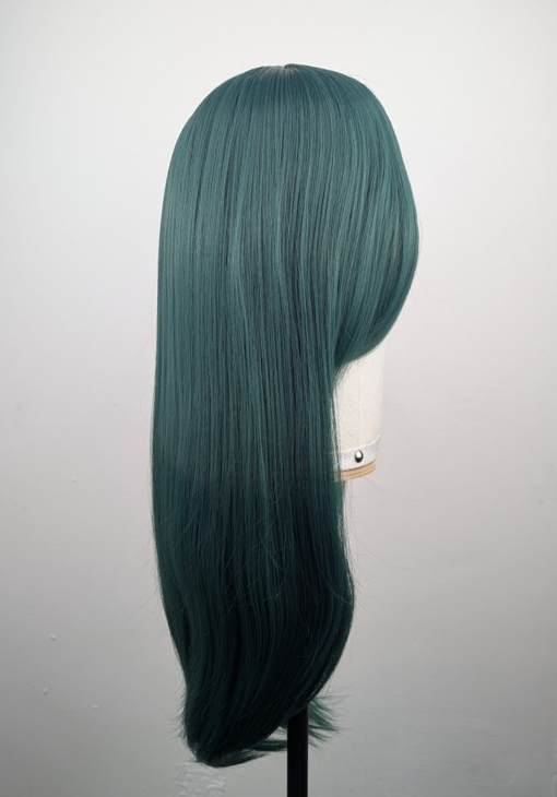 Outlet #172 - Lush Wigs UK This dark green wig from roots to tips. Styled sleek with long layers falling to the waist. The fringe is long and sleek, wear it to the side or parted for curtain bangs.