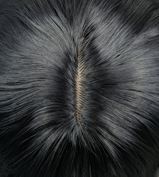 Black Tea is a natural one length bob styled in tousled waves that give plenty of volume and texture. Black from roots to tips with a blunt fringe.