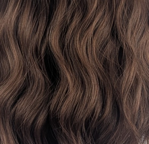 Chai - Lush Wigs UK Chai is a natural and simple bob style that comes in a light brown colour. Styled in loose beachy waves for texture.