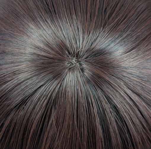 Chocolate - Lush Wigs UK This natural wig is a mix of warm auburn and brown colours with russet undertones. Styled sleek with long layers at the front. A full blunt fringe gives a full volume look to this medium-long layered style.
