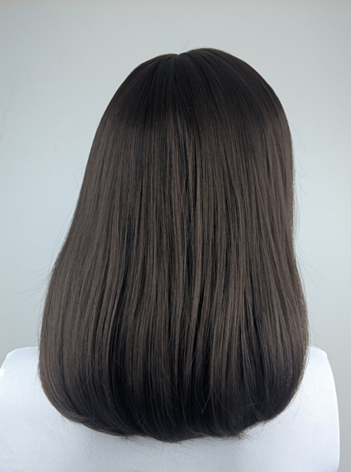 Lilly - Lush Wigs UK Lilly is a soft and natural warm chestnut tone from roots to tips. A graduated cut that curls under, falling just below the jawline, with a sleek blunt fringe. A simple yet stylish cut that’s easy to maintain.