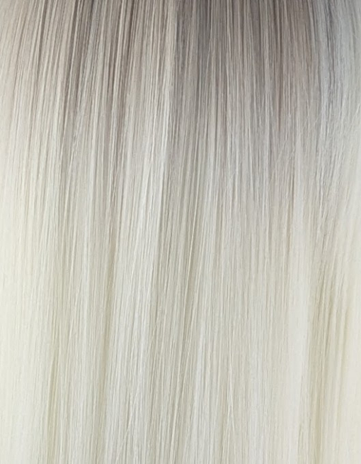 Lorna - Lush Wigs UK Lorna is a rework of the platinum blonde colour with a muted lemon undertone, producing a bleach blonde effect. A sprinkle of sandy blonde roots, creating a natural feel. Poker straight, long one length bob (lob) with a sleek full blunt fringe.